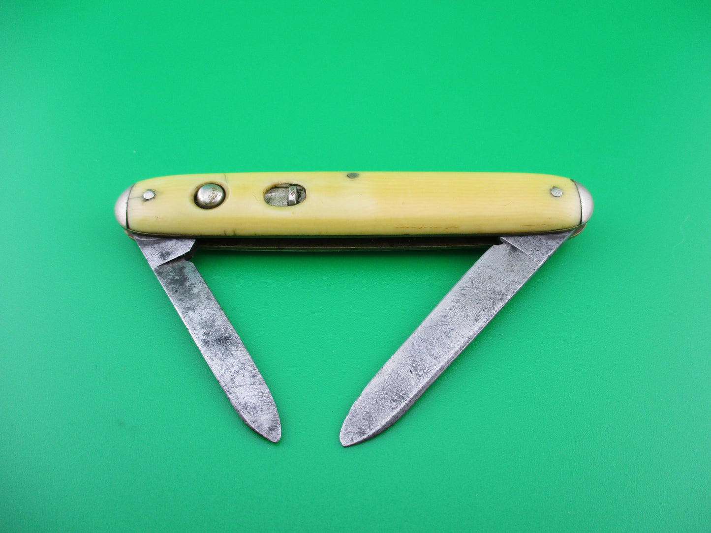 NORVELL SHAPLEIGH Medium Double Ivory cell tip bolsters switchblade knife