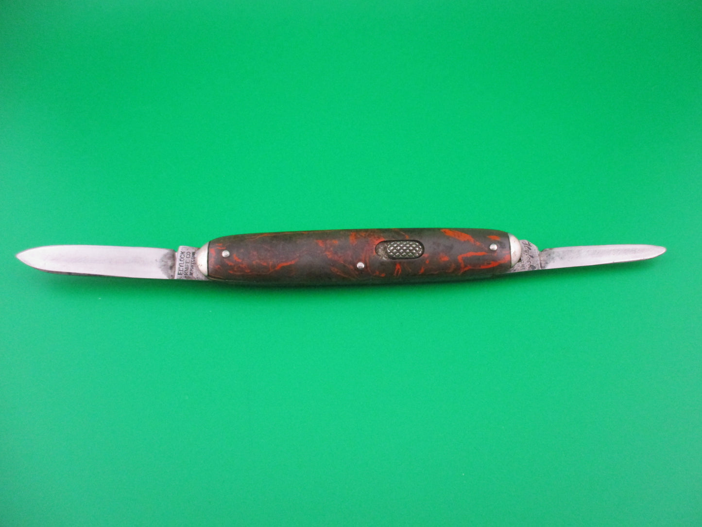 Flylock Double Olive Orange celluloid vintage automatic knife