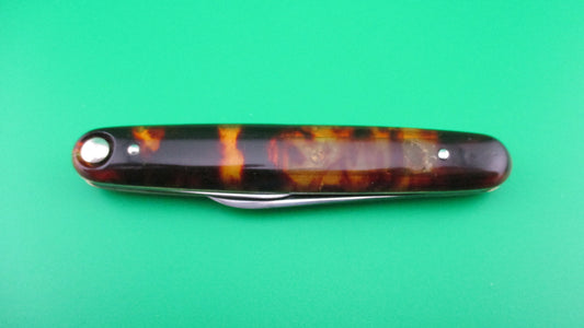 z Press Button Knife Co medium double Tortoise Cell etched STILETTO w/ sword