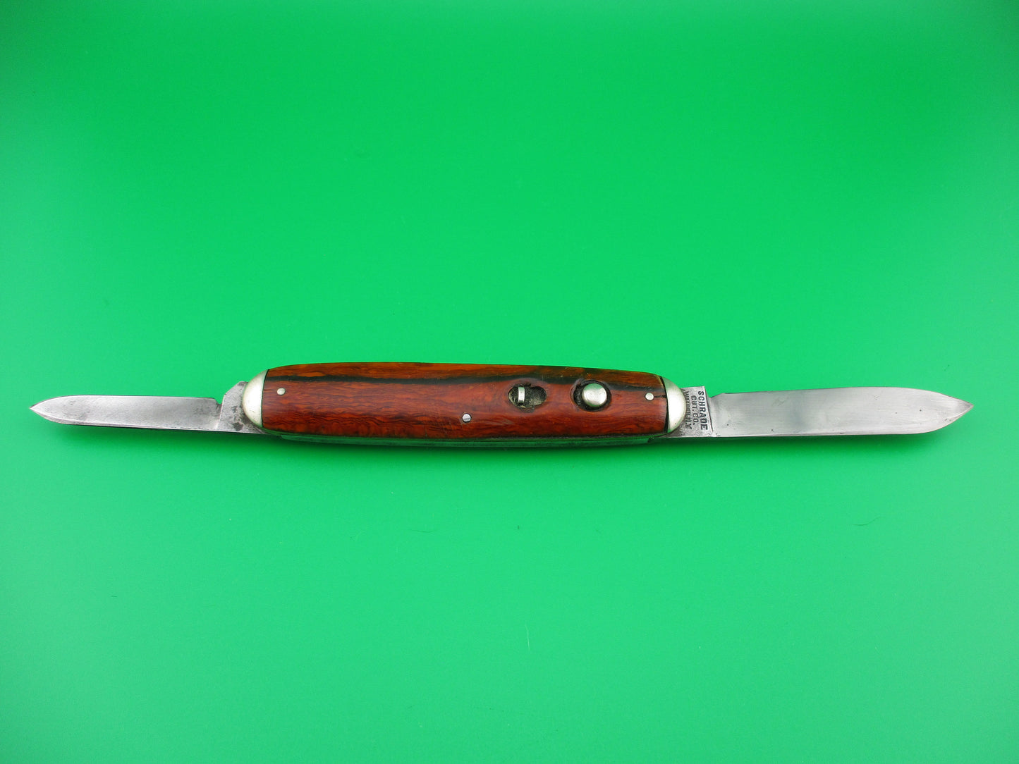 SCHRADE CUT CO Large double Cocobolo Tip bolster switchblade knife